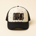 Kindness Speaks black and cream trucker hat with BE KIND hand-sign patch and silver rhinestones on a cream background