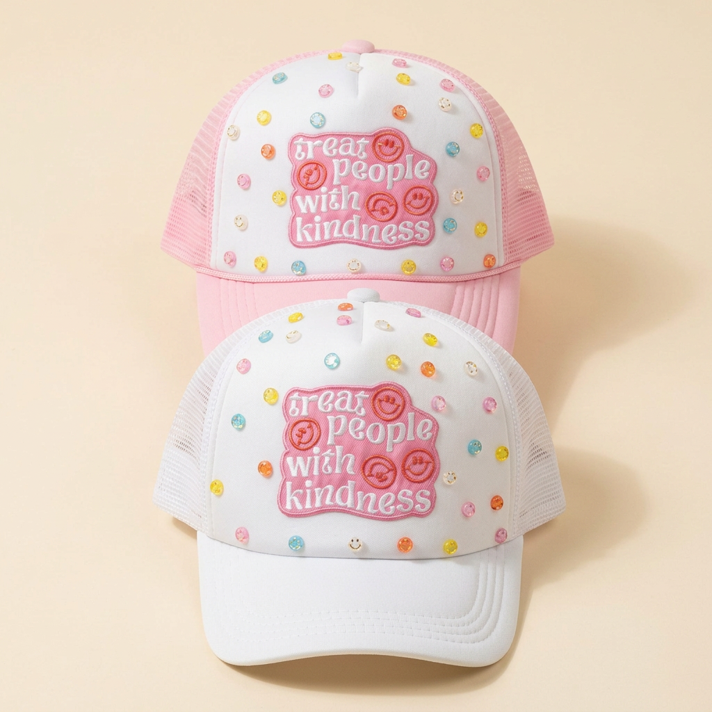 Front view of matching pink and white Kindness N Sunshine hats on a cream background